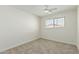 Bedroom with neutral carpet, window, and ceiling fan at 1712 N Old Colony --, Mesa, AZ 85201