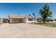 Wide driveway leading to a carport, showcasing ample parking space for residents and visitors at 1712 N Old Colony --, Mesa, AZ 85201