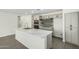 Open kitchen featuring a large central island, stainless appliances and a modern design at 1712 N Old Colony --, Mesa, AZ 85201