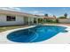 Backyard pool with concrete trim, connecting to a covered patio at 1712 N Old Colony --, Mesa, AZ 85201