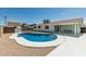 Backyard with pool, patio, and white exterior at 1712 N Old Colony --, Mesa, AZ 85201