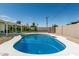 Backyard pool with concrete trim, brick wall surround and view of the home at 1712 N Old Colony --, Mesa, AZ 85201