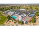 Aerial view of community amenities, including a pool, tennis courts, and recreation center at 17812 W Primrose W Ln, Surprise, AZ 85374