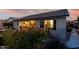 Charming backyard with covered patio and lush landscaping at 17812 W Primrose W Ln, Surprise, AZ 85374