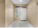 Bright foyer with tiled flooring and decorative glass-block window at 17812 W Primrose W Ln, Surprise, AZ 85374