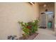 Inviting front entrance with a garden and security door at 17812 W Primrose W Ln, Surprise, AZ 85374