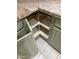 Corner kitchen cabinet equipped with rotating shelves for easy access and efficient storage solutions at 17812 W Primrose W Ln, Surprise, AZ 85374