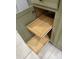 Pull-out drawers in a kitchen cabinet showcase organized storage for kitchen essentials at 17812 W Primrose W Ln, Surprise, AZ 85374
