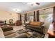 Inviting living room with plenty of natural light and comfortable seating arrangement at 17812 W Primrose W Ln, Surprise, AZ 85374
