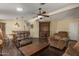 Spacious living room with dark wood floors and comfortable seating at 215 N Power Rd # 21, Mesa, AZ 85205