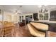 Open concept kitchen and living area with a sliding glass door for outdoor access at 215 N Power Rd # 21, Mesa, AZ 85205