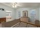Bright primary bedroom featuring ensuite bathroom access, and plenty of space and natural lighting at 215 N Power Rd # 21, Mesa, AZ 85205