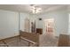 View of a bright main bedroom with ensuite bathroom and walk-in closet access at 215 N Power Rd # 21, Mesa, AZ 85205