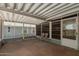 Enclosed patio with slate tile flooring and view of the backyard at 215 N Power Rd # 21, Mesa, AZ 85205