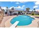 Inviting backyard with a sparkling pool, diving board, and ample patio space, perfect for summer fun at 2207 W Bentrup St, Chandler, AZ 85224