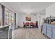 Bright dining area with views to the kitchen and sliding glass doors at 2207 W Bentrup St, Chandler, AZ 85224