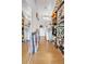 Functional laundry room with storage shelves and washer/dryer units at 2207 W Bentrup St, Chandler, AZ 85224