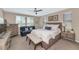 Serene main bedroom featuring soft lighting, a comfortable bed, and coordinated furnishings at 22353 N 99Th Ln, Peoria, AZ 85383