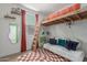 This playful bedroom has a raised bed, a seating area, and great natural light at 22853 E Calle Luna --, Queen Creek, AZ 85142