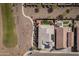 Aerial view of property and neighboring properties with walking paths and community green spaces at 24847 N 175Th Dr, Surprise, AZ 85387