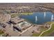 Panoramic aerial view of new construction homes in a planned community with green spaces at 24847 N 175Th Dr, Surprise, AZ 85387