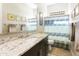 Bathroom featuring granite countertops, a modern sink and fixtures at 24847 N 175Th Dr, Surprise, AZ 85387