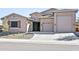 Charming single-Gathering home with a well-manicured desert landscape and a spacious three-car garage at 24847 N 175Th Dr, Surprise, AZ 85387