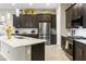Well-equipped kitchen with granite countertops, stainless steel appliances, and ample cabinet space at 24847 N 175Th Dr, Surprise, AZ 85387