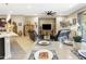 Open living space with a seamless transition from the kitchen and dining areas to the living room at 24847 N 175Th Dr, Surprise, AZ 85387