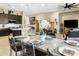 Spacious, open-concept living area features kitchen, dining, and living room at 24847 N 175Th Dr, Surprise, AZ 85387