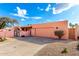 The exterior of the home features desert landscaping, a two car garage, and a front courtyard at 2843 E Captain Dreyfus Ave, Phoenix, AZ 85032