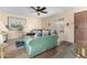 Bright living room with a comfortable sofa, accent pillows, and stylish decor at 2843 E Captain Dreyfus Ave, Phoenix, AZ 85032