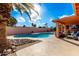 Beautiful backyard pool with mature landscaping, perfect for outdoor relaxation and entertainment at 2843 E Captain Dreyfus Ave, Phoenix, AZ 85032