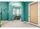 Bedroom featuring a fun alcove, arched windows, a white ceiling fan, and neutral carpet at 3229 E Mountain Village Cir, Phoenix, AZ 85042