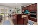Kitchen with granite countertops, stainless steel appliances, and ample cabinet space at 3229 E Mountain Village Cir, Phoenix, AZ 85042