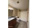 Bathroom view showcases a vanity sink, toilet, and bathtub with shower at 3434 E Baseline Rd # 204, Phoenix, AZ 85042