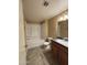 Bathroom with vanity, tile floor, and tub with shower head at 3434 E Baseline Rd # 204, Phoenix, AZ 85042