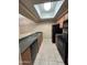 A bright kitchen with black appliances and wood cabinets at 3434 E Baseline Rd # 204, Phoenix, AZ 85042
