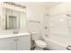 Bathroom features a shower, vanity, toilet, and medicine cabinet at 3513 W Maryland Ave, Phoenix, AZ 85019
