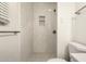This bathroom features a tiled shower and a modern sink and vanity at 3513 W Maryland Ave, Phoenix, AZ 85019