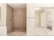 Bathroom shower with stylish tile, and white sliding door closet at 3513 W Maryland Ave, Phoenix, AZ 85019