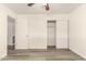This bedroom features wood-look floors and a double door closet for ample storage space at 3513 W Maryland Ave, Phoenix, AZ 85019