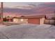Beautiful single-Gathering home featuring a spacious driveway, a two-car garage and a well-manicured lawn at 3513 W Maryland Ave, Phoenix, AZ 85019