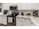 Well-equipped kitchen with stainless steel appliances, granite counters, and white subway tile backsplash at 3532 W Mesquite Ave, San Tan Valley, AZ 85144