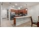 Modern kitchen with stainless steel appliances, breakfast bar, and pendant lighting at 4152 W Bradshaw Creek Ln, New River, AZ 85087