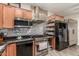 Modern kitchen design with stainless steel appliances, stylish backsplash, and functional layout at 4152 W Bradshaw Creek Ln, New River, AZ 85087