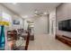 Inviting living space with a plush sectional sofa and a sliding glass door to the backyard at 4152 W Bradshaw Creek Ln, New River, AZ 85087