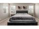 Serene main bedroom featuring ample natural light, and plush carpeting for a peaceful ambiance at 4152 W Bradshaw Creek Ln, New River, AZ 85087