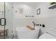Modern bathroom featuring a soaking tub, shower, and decorative tile flooring at 4238 E Mitchell Dr, Phoenix, AZ 85018
