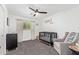 Bright Bedroom featuring a crib, changing table, and stylish decor for a comforting space at 4238 E Mitchell Dr, Phoenix, AZ 85018